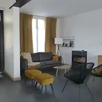 Maison En