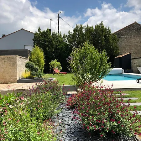 Maison En *