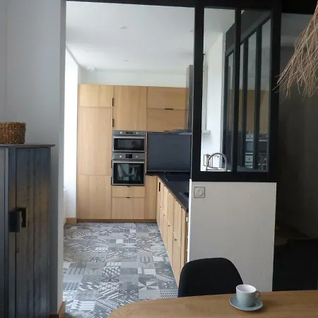 Maison En